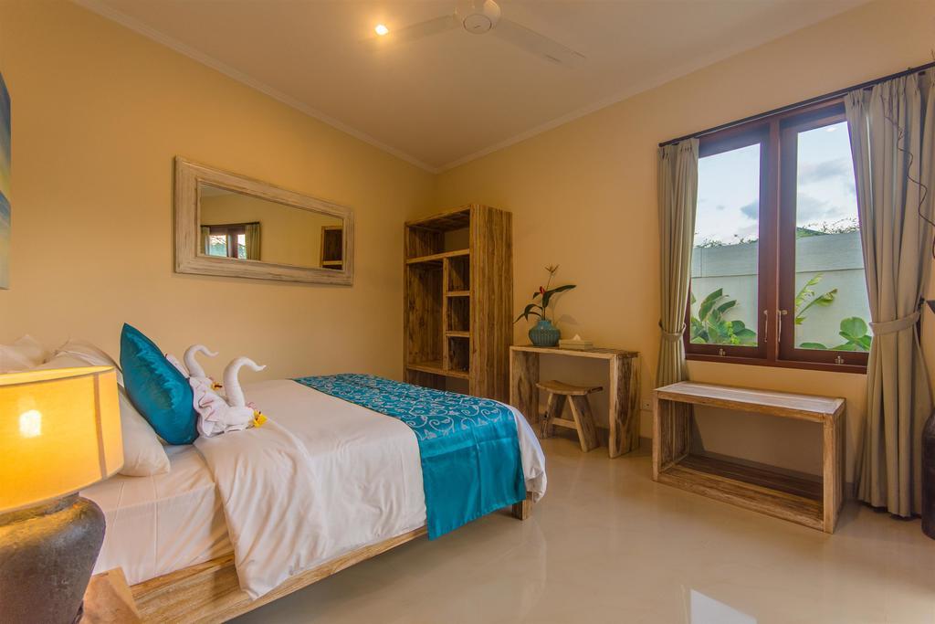 Villa Tepi Sungai Legian Værelse billede